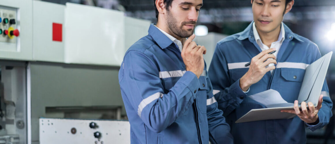 male-asian-caucasian-engineer-professional-having-discussion-standing-consult-machine-factory-two-expert-coworker-brainstorm-explaining-solves-process-cnc-operate-machine